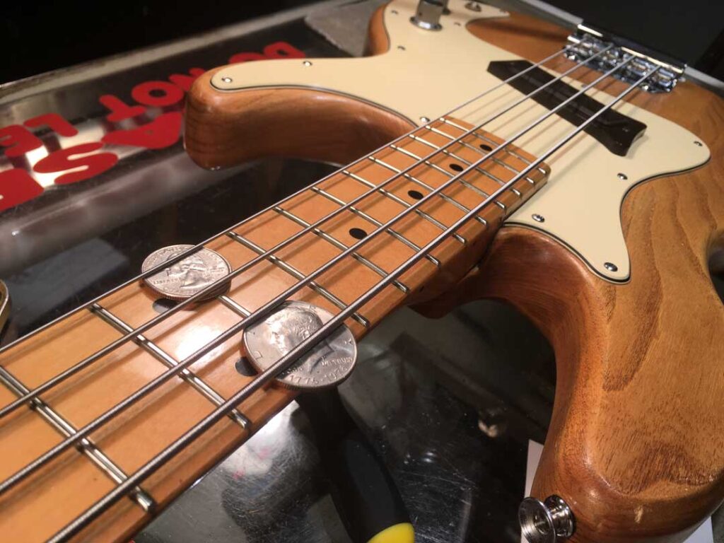 Measuring string height on a Peavey T-20 bass