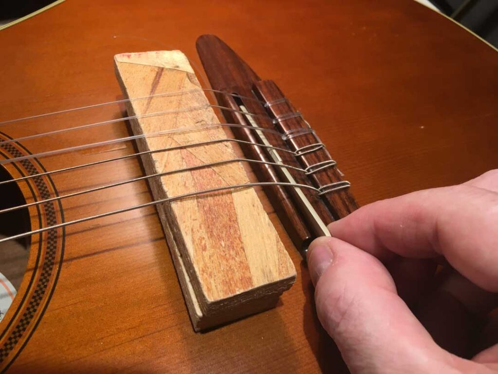 Removing a classical saddle bridge