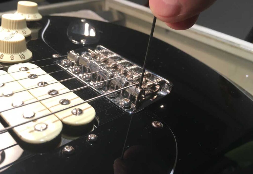 Adjusting saddle height on a Stratocaster