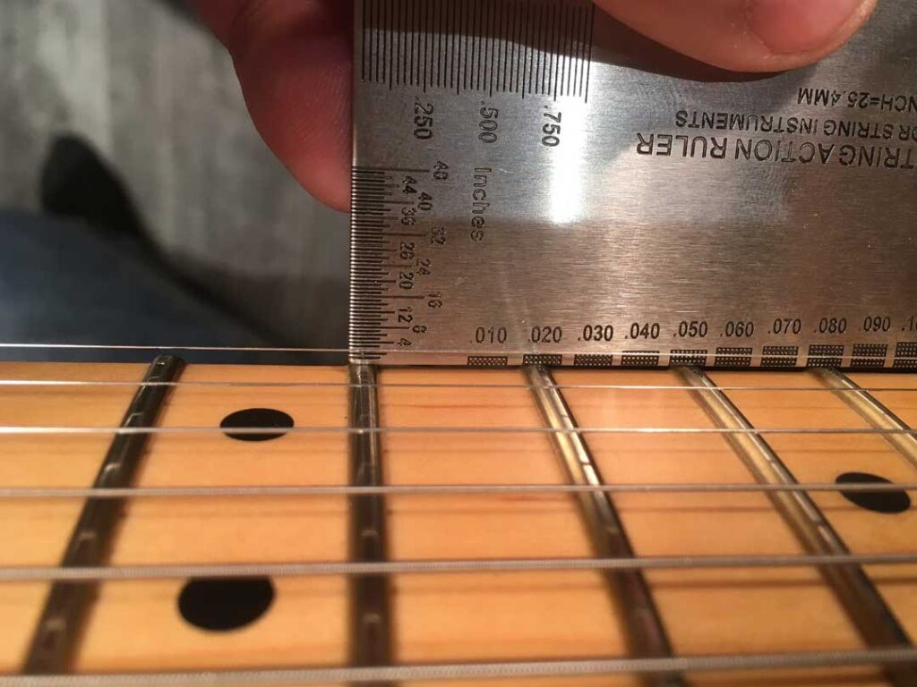 Measuring first string height at the 12th fret